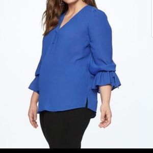 Brand new tunic with tie cuffs